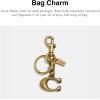 imageCoach Womens Signature Bag Charm Key Chain Brass Small