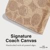 imageCoach Signature Canvas Two Piece Detachable Wallet Folio iPhone 15 Pro Case Compatible with Wireless Charging  Signature CharcoalTan Wallet