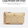 imageCoach Womens Signature Large Wristlet W ChainLight Khaki  Chalk