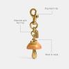 imageCoach Womens Resin Mushroom Bag CharmMustard