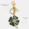 image:imageCOACH Bag CharmFour Leaf Clover
